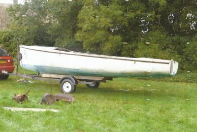 The boat all set to travel back to Wales. Just need to strap it down, and find somewhere to put 30â€™ of mast.
Keywords: n18-sibrwd
